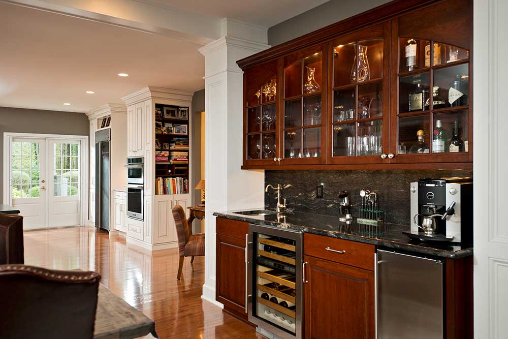 A Wet Bar Is Fitted With A Wine Fridge Bar Sink And Glass Door